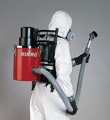 Industrial HEPA vacuum being used during mold remediation to capture microscopic mold spores