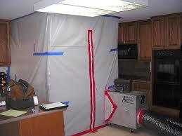 Polyethylene sheeting containment barrier set up during mold remediation to prevent spore spread